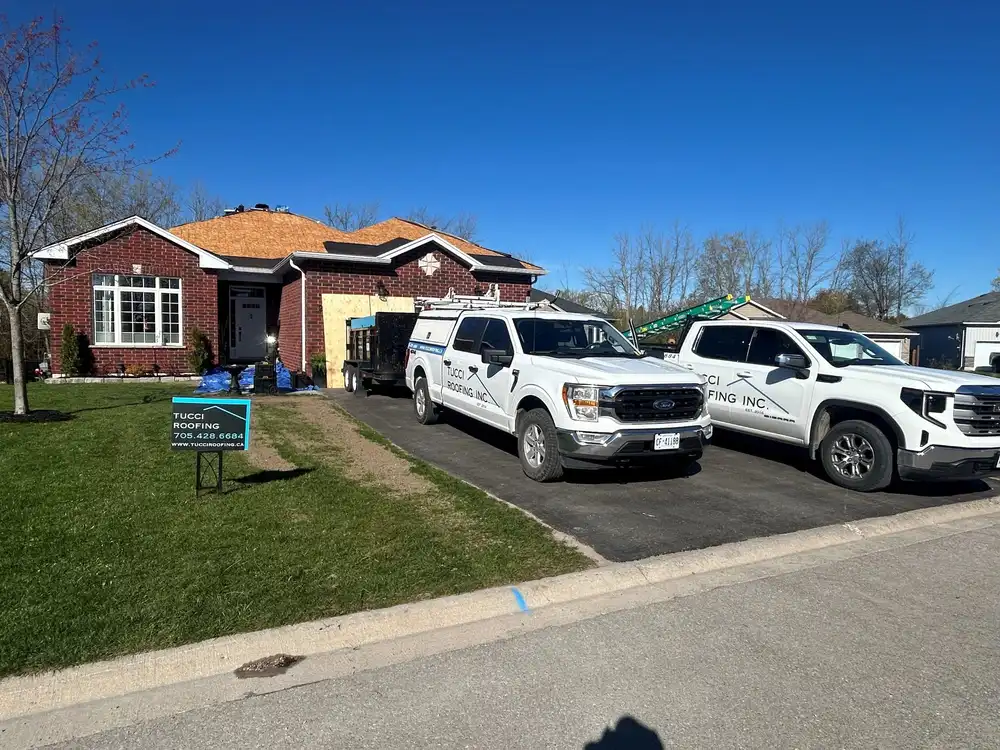 Tucci Roofing service truck on site